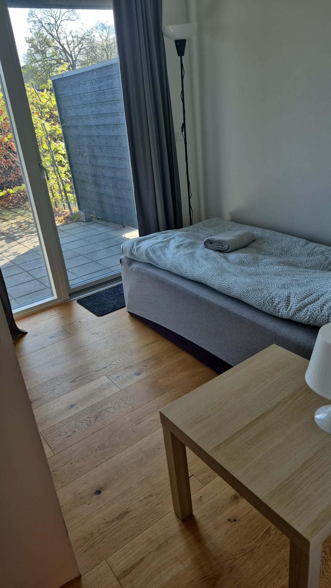 Bedroom with terrace access at Aasvej in Solroed